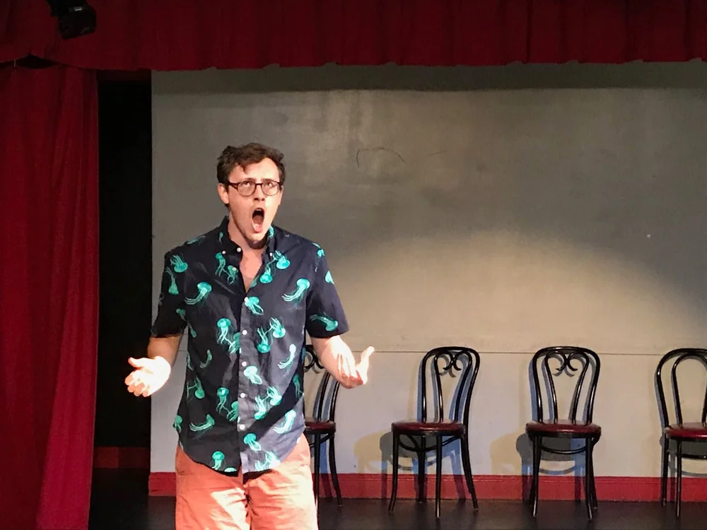 Dan Titmuss performing Radioactive on stage