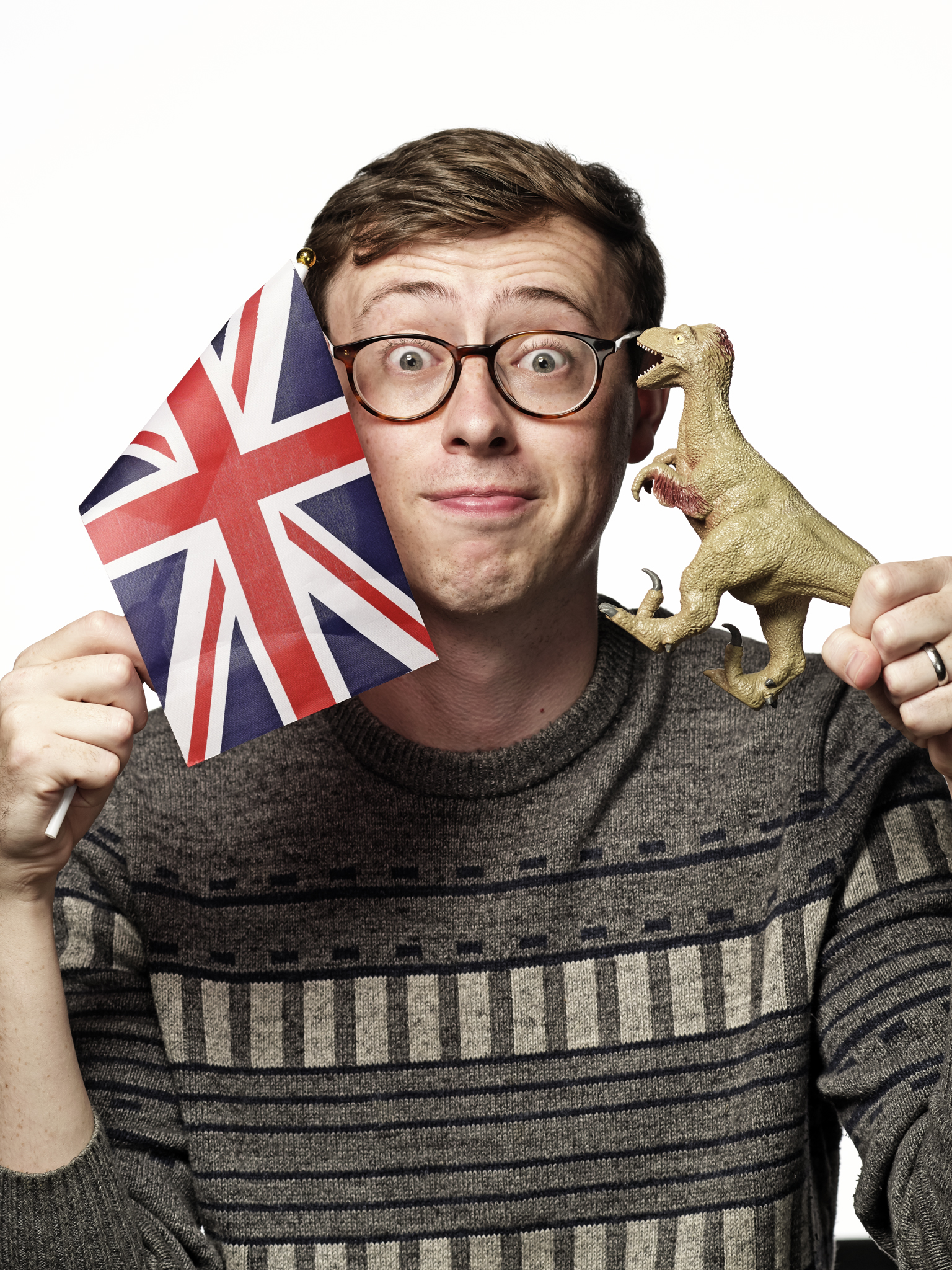 Dan Titmuss — with a Union Jack and a toy dinosaur
