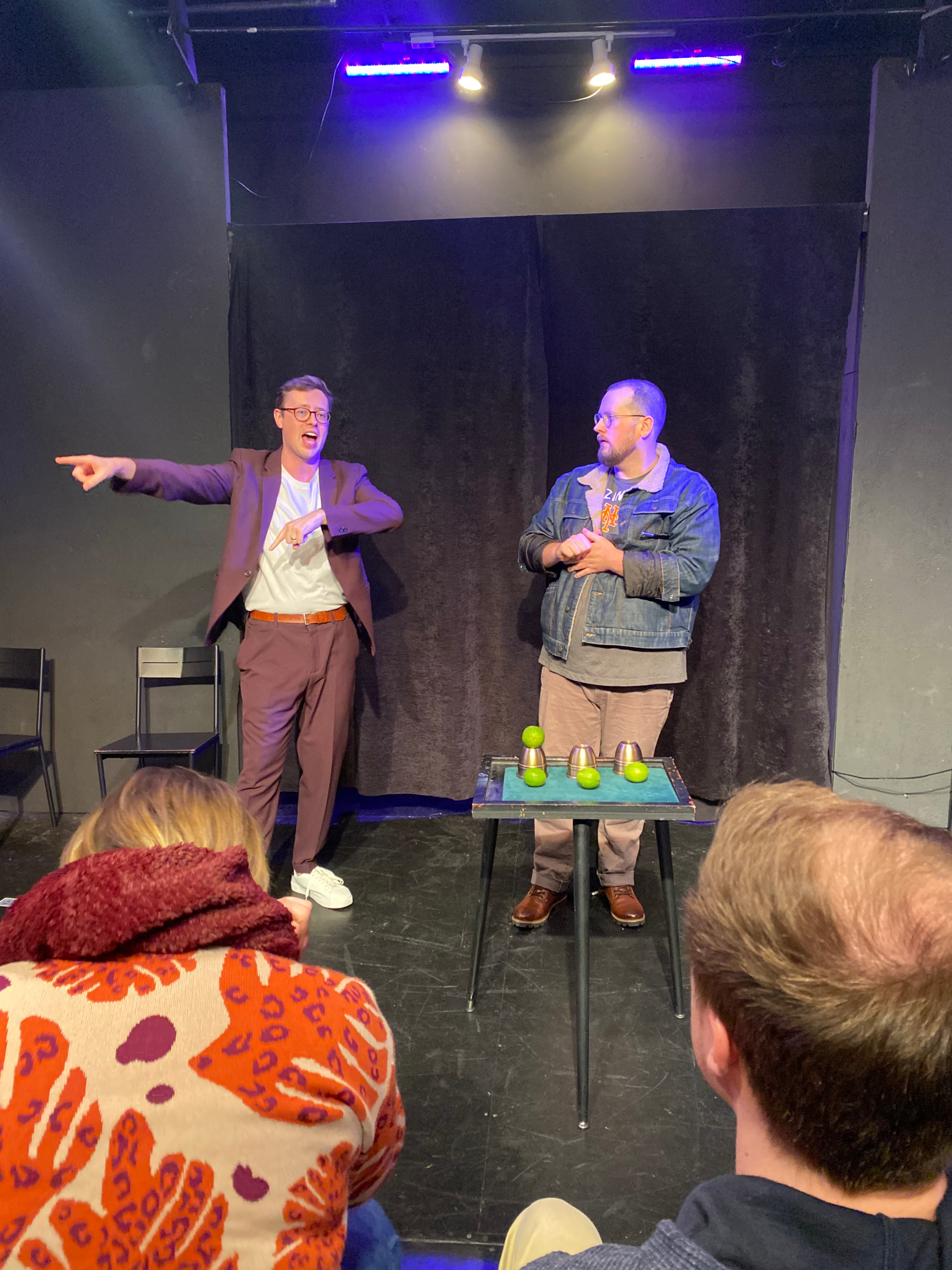 Dan Titmuss performing a cup and ball trick